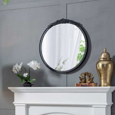 Espejo redondo decorativo con marco negro